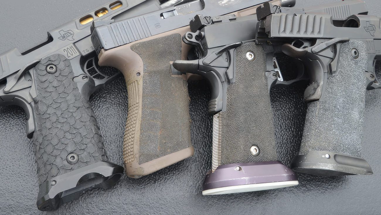 Four handguns with customised grips-standard-width-1300px